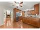 Kitchen features stainless steel appliances and hardwood floors at 5775 Lakeshore Dr, Buford, GA 30518