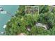 Lakefront property with private dock and lush surroundings at 5775 Lakeshore Dr, Buford, GA 30518