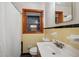 Clean bathroom with yellow tile, shower, and vanity at 822 Gertrude Nw Pl, Atlanta, GA 30318