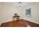 Home office with hardwood floors, desk and chair, and natural light at 822 Gertrude Nw Pl, Atlanta, GA 30318