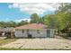 Ranch home with a spacious backyard and patio at 822 Gertrude Nw Pl, Atlanta, GA 30318