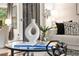 Stylish coffee table with modern decor, including a vase, book, and plant at 46 Monet Nw Ct, Atlanta, GA 30327