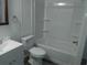 Clean bathroom with a white tub/shower combo and vanity at 64 Luther Knight Se Rd, Cartersville, GA 30121