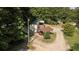 Aerial view of a mobile home on a wooded lot with a carport at 64 Luther Knight Se Rd, Cartersville, GA 30121