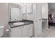 Bathroom with vanity, toilet, and access to bedroom at 3655 Habersham Ne Rd # 215, Atlanta, GA 30305