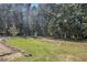 Spacious backyard with shed and wooded area at 103 Royal Way, Mcdonough, GA 30252