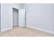 Bright bedroom with neutral walls and carpet at 6186 Ripple Way # 84, South Fulton, GA 30349