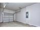 Garage with automatic door opener and electrical panel at 6186 Ripple Way # 84, South Fulton, GA 30349