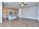 Spacious living room with hardwood floors and kitchen view at 6186 Ripple Way # 84, South Fulton, GA 30349