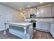 Modern kitchen with stainless steel appliances and light gray cabinets at 6186 Ripple Way # 84, South Fulton, GA 30349