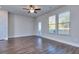Bright living room with hardwood floors and backyard access at 6186 Ripple Way # 84, South Fulton, GA 30349