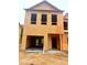 New construction townhome exterior with a two-car garage at 6186 Ripple Way # 84, South Fulton, GA 30349