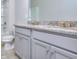 Double vanity bathroom with granite countertop at 6186 Ripple Way # 84, South Fulton, GA 30349