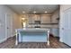 Modern kitchen with stainless steel appliances and island at 6186 Ripple Way # 84, South Fulton, GA 30349