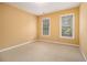 Simple bedroom with neutral walls and carpet flooring at 3928 Herron Sw Ln, Atlanta, GA 30349