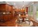 Eat-in kitchen with hardwood floors and island at 3928 Herron Sw Ln, Atlanta, GA 30349