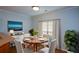 Elegant dining room featuring a wood table and hardwood floors at 6865 Cowan Mill Rd, Winston, GA 30187