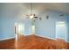 Spacious living room with hardwood floors and vaulted ceiling at 6865 Cowan Mill Rd, Winston, GA 30187