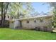 Brick house with a green door and a spacious backyard at 3523 Se Garfield Se Way, Atlanta, GA 30354