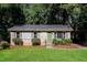 Brick ranch house with a green door and carport at 3523 Se Garfield Se Way, Atlanta, GA 30354