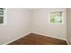 Simple bedroom with hardwood floors and window at 3523 Se Garfield Se Way, Atlanta, GA 30354