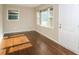 Bright living room with hardwood floors and large windows at 3523 Se Garfield Se Way, Atlanta, GA 30354