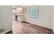Eat-in kitchen with white cabinets and granite countertops at 700 Symphony Nw Ln, Atlanta, GA 30318