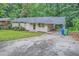 Ranch house with carport and spacious yard at 700 Symphony Nw Ln, Atlanta, GA 30318