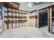 Unfinished basement area with built in shelving at 700 Symphony Nw Ln, Atlanta, GA 30318
