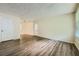 Open living room featuring wood-look floors at 700 Symphony Nw Ln, Atlanta, GA 30318