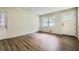 Bright living room featuring hardwood floors and neutral walls at 700 Symphony Nw Ln, Atlanta, GA 30318