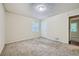 Bright bedroom with neutral walls and carpet at 700 Symphony Nw Ln, Atlanta, GA 30318