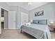 Spacious bedroom with a king-size bed and neutral decor at 10 Argyll Way, Covington, GA 30014