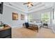 Main bedroom with king bed and two windows at 10 Argyll Way, Covington, GA 30014