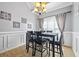 Bright dining room with table and six chairs at 10 Argyll Way, Covington, GA 30014