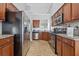 Modern kitchen with stainless steel appliances at 10 Argyll Way, Covington, GA 30014