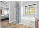 Bathroom with shower, bathtub and updated vanity at 10 Argyll Way, Covington, GA 30014