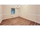 Bright dining room with hardwood floors and window view at 1123 Redan Way, Stone Mountain, GA 30088