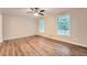 Spacious living room featuring hardwood floors and large windows at 1123 Redan Way, Stone Mountain, GA 30088