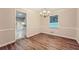 Dining room with hardwood floors, chair railing, and chandelier at 1123 Redan Way, Stone Mountain, GA 30088