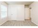 Bedroom with carpet flooring and access to two other rooms at 6393 Shadow Sq, Lithonia, GA 30058