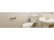 Simple bathroom with pedestal sink and toilet at 6393 Shadow Sq, Lithonia, GA 30058