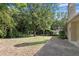 Large backyard with grassy area and patio at 3216 Guynelle Dr, Marietta, GA 30066