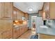 Modern kitchen with wood cabinets, granite countertops, and stainless steel appliances at 3216 Guynelle Dr, Marietta, GA 30066