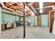 Unfinished basement with a workspace and storage area at 3216 Guynelle Dr, Marietta, GA 30066