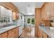 Kitchen boasts light wood cabinets, granite countertops, and a breakfast nook at 3216 Guynelle Dr, Marietta, GA 30066