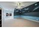 Upstairs bedroom with a celestial mural, ceiling fan, and ample natural light at 403 Pebblebrooke Ln, Canton, GA 30115