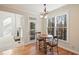 Charming breakfast nook with wood flooring and access to a deck at 403 Pebblebrooke Ln, Canton, GA 30115