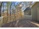 Wooden deck overlooking a wooded area with steps leading down at 403 Pebblebrooke Ln, Canton, GA 30115