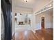 Hardwood floors and an open view into the living room and kitchen at 403 Pebblebrooke Ln, Canton, GA 30115